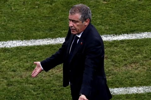 Portugal head coach Fernando Santos makes a gesture during the round of 16 match between Uruguay and Portugal at the 2018 soccer World Cup at the Fisht Stadium in Sochi, Russia, Saturday, June 30, 2018. (AP Photo/Darko Vojinovic)