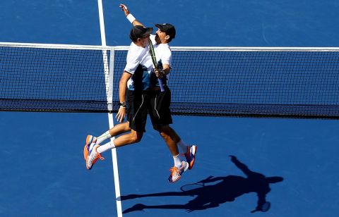 NEW YORK, NY - SEPTEMBER 04:  Bob Bryan and Mike Bryan of the United States celebrate after defeating Scott Lipsky and Rajeev Ram of the United States during their men's doubles semifinal match on Day Eleven of the 2014 US Open at the USTA Billie Jean King National Tennis Center on September 3, 2014 in the Flushing neighborhood of the Queens borough of New York City.  (Photo by Al Bello/Getty Images)