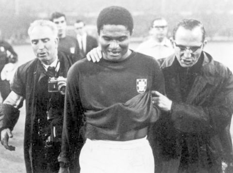 Portugal's Eusebio walks off in tears after his team were beaten 2-1 and eliminated from the World Cup