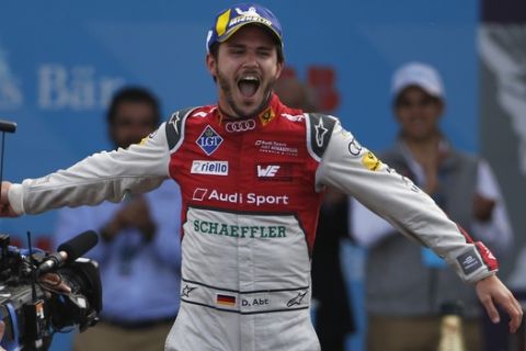 Audi Sport ABT Schaeffler driver Daniel Abt celebrates his victory in the Formula E Mexico City ePrix auto race, in Mexico City, Saturday, March 3, 2018. (AP Photo/Marco Ugarte)