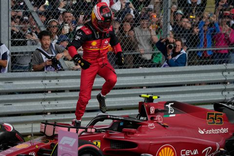 Ferrari driver Carlos Sainz of Spain celebrates after winning the British Formula One Grand Prix at the Silverstone circuit, in Silverstone, England, Sunday, July 3, 2022. (AP Photo/Matt Dunham)
