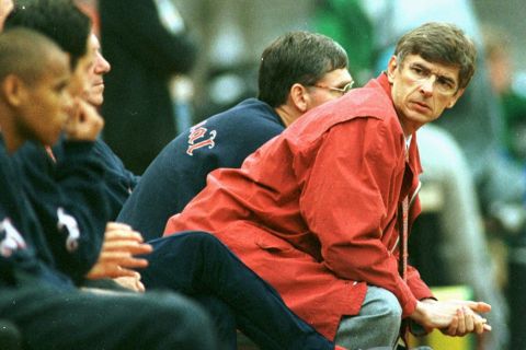 Arsenal's coach Arsene Wenger and substitute players watching the  UEFA Cup first round second leg match Borussia Moenchengladbach vs. Arsenal London at the Cologne stadium Wednesday night, September 25, 1996. Moenchengladbach won the match by 3-2 goals. (AP PHOTO/Edgar Schoepal)
