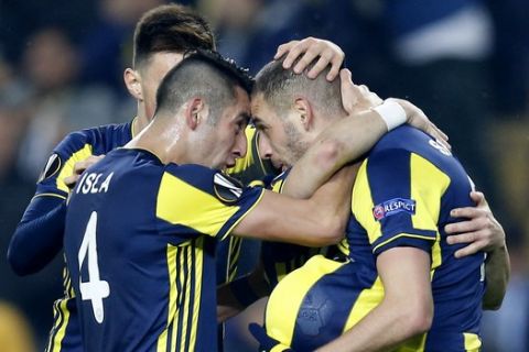 Fenerbahce players celebrate their goal against Zenit St. Petersburg during the Europa League round of 32 soccer match between Fenerbahce and Zenit, in Istanbul, Tuesday, Feb. 12, 2019. (AP Photo/Lefteris Pitarakis)