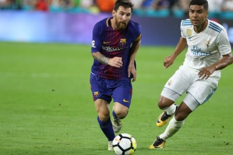IMAGE DISTRIBUTED FOR INTERNATIONAL CHAMPIONS CUP - FC Barcelona's Leonel Messi (#10) advancing against Real Madrid FC's Casemiro (#14) on Saturday, July 29, 2017, in Miami. (Marc Serota/AP Images for International Champions Cup)