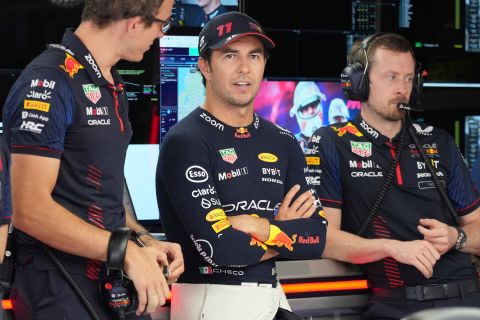 Red Bull driver Sergio Perez of Mexico, centre, is in garage during the third practice ahead of the Japanese Formula One Grand Prix at the Suzuka Circuit, Suzuka, central Japan, Saturday, Sept. 23, 2023. (AP Photo/Toru Hanai)