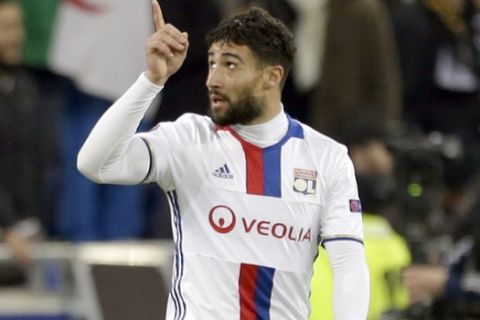 Lyon's Nabil Fekir reacts while celebrating his side's 3ed goal during a Europa League round of 16 first leg soccer match between Lyon and Roma in Decines, near Lyon, central France, Thursday, March 9, 2017. (AP Photo/Claude Paris)