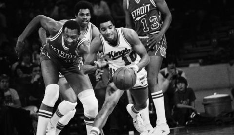 Detroit Pistons' Bob Lanier, left, goes after Kansas City Kings' Otis Birdsong, right, after Birdsong stole the ball away from Lanier during Friday's NBA game at Kemper Arena, Feb. 2, 1979. Lanier was charged with a foul on the play. In the background is Kings? Bill Robinzine. (AP Photo/)