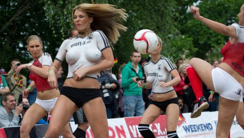 Porn actresses with body paint football jerseys take part in a fun soccer match of Germany vs Denmark on June 16, 2012 in Berlin, one day before the Euro 2012 football championship's match Germany vs Denmark to take place in Lviv, Ukraine. In the fun match, the girls of Denmark won 13-1.     AFP PHOTO / JOHANNES EISELEJOHANNES EISELE/AFP/GettyImages