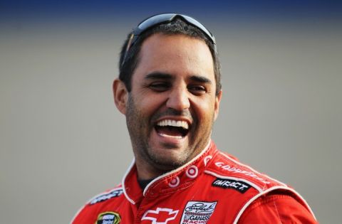FONTANA, CA - MARCH 25:  Juan Pablo Montoya, driver of the #42 Target Chevrolet, stands on pit road during qualifying for the NASCAR Sprint Cup Series Auto Club 400 at Auto Club Speedway on March 25, 2011 in Fontana, California.  (Photo by Jeff Gross/Getty Images for NASCAR)