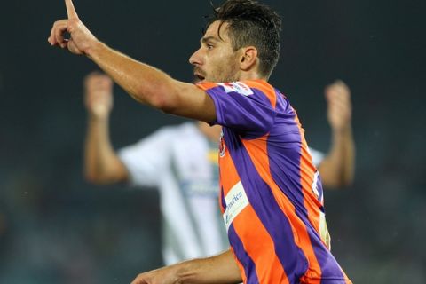 Kostas Katsouranis of FC Pune City celebrates scoring the second goal for Pune during match 24 of the Hero Indian Super League between Atlético de Kolkata and FC Pune City held at the Salt Lake Stadium in Kolkata, West Bengal, India on the 7th November 2014.

Photo by:  Ron Gaunt/ ISL/ SPORTZPICS