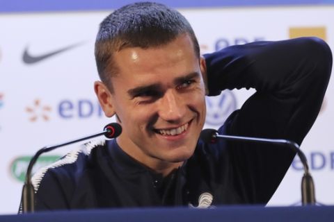 France's Antoine Griezmann smiles as he answers to journalists during a press conference at the 2018 soccer World Cup in Istra, Russia, Tuesday, June 12, 2018. (AP Photo/David Vincent)