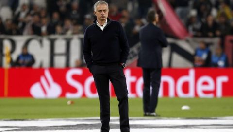 ManU coach Jose Mourinho stands on the pitch prior to the Champions League group H soccer match between Juventus and Manchester United at the Allianz stadium in Turin, Italy, Wednesday, Nov. 7, 2018. (AP Photo/Antonio Calanni)