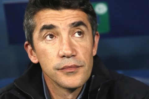 Benfica's head coach Bruno Lage waits for the start of the Champions League group G soccer match between Zenit St.Petersburg and Benfica at the Saint Petersburg stadium in St.Petersburg, Russia, Wednesday, Oct. 2, 2019. (AP Photo/Mike Kireev)