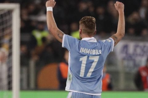 Lazio's Ciro Immobile celebrates after scoring during an Italian Cup, first-leg, semifinal soccer match between Lazio and Roma, at the Rome Olympic stadium, Wednesday, March 1, 2017. (AP Photo/Gregorio Borgia)