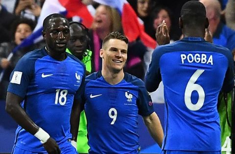 France's forward Kevin Gameiro (C) celebrates with France's midfielder Moussa Sissoko (L) and Paul Pogba after scoring an equalizer during the FIFA World Cup 2018 qualifying football match France vs Bulgaria on October 7, 2016 at the Stade de France stadium in Saint-Denis, north of Paris. / AFP PHOTO / FRANCK FIFEFRANCK FIFE/AFP/Getty Images