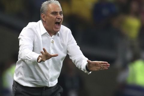 Brazil's coach Tite reacts during a Copa America semifinal soccer match against Argentina at the Mineirao stadium in Belo Horizonte, Brazil, Tuesday, July 2, 2019. (AP Photo/Natacha Pisarenko)