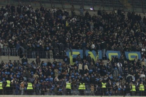 Inter Milan supporters cheer during an Italian major league soccer match between Inter Milan and Genoa at the San Siro stadium in Milan, Italy, Wednesday, Oct.31, 2007. Authorities closed Inter's 'Curva Nord' or north bend, at the San Siro stadium for one match after racist banners were displayed against Napoli. (AP Photo/Luca Bruno)