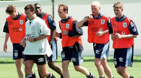 England soccer squad members, from left, Darren Anderton, Sol Campbell, David Platt, Paul Gascoigne and Gary Neville are put through their paces by former England captain Bryan Robson (front), during an England's training session at Bisham Abbey, near London, Tuesday June 4, 1996. England are scheduled to kick off against Switzerland, in the first match of the European Nations championships at London Wembledy Stadium on June 8.(AP Photo/Michael Stephens) <%% 0 PICTURE_OK HEADER_OK 1 1 %%>