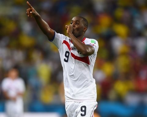 FORTALEZA, BRAZIL - JUNE 14:  Joel Campbell of Costa Rica celebrates after defeating Uruguay 3-1 during the 2014 FIFA World Cup Brazil Group D match between Uruguay and Costa Rica at Castelao on June 14, 2014 in Fortaleza, Brazil.  (Photo by Laurence Griffiths/Getty Images)