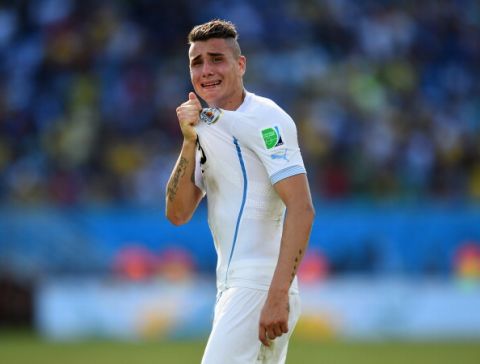 NATAL, BRAZIL - JUNE 24:  Jose Gimenez of Uruguay celebrates the 1-0 win in the 2014 FIFA World Cup Brazil Group D match between Italy and Uruguay at Estadio das Dunas on June 24, 2014 in Natal, Brazil.  (Photo by Shaun Botterill - FIFA/FIFA via Getty Images)