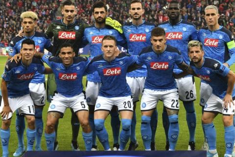 Napoli players pose for photographers prior to the start of the Champions League group E soccer match between FC Red Bull Salzburg and Napoli in Salzburg, Austria, Wednesday, Oct. 23, 2019. (AP Photo/Kerstin Joensson)