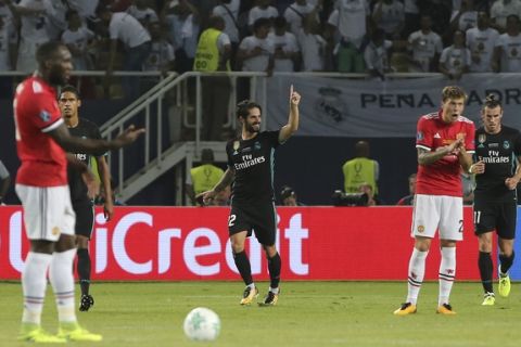 Real Madrid's Isco celebrates his goal against Manchester United during the UEFA Super Cup final soccer match between Real Madrid and Manchester United at Philip II Arena in Skopje, Tuesday, Aug. 8, 2017. (AP Photo/Boris Grdanoski)