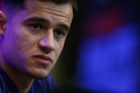 Barcelona's new signing Brazilian Philippe Coutinho attends his official presentation at the Camp Nou stadium in Barcelona, Spain, Monday, Jan. 8, 2018. Coutinho is joining Barcelona after Liverpool agreed Saturday to sell the Brazilian in a deal that makes him one of the most expensive players in soccer history. (AP Photo/Manu Fernandez)