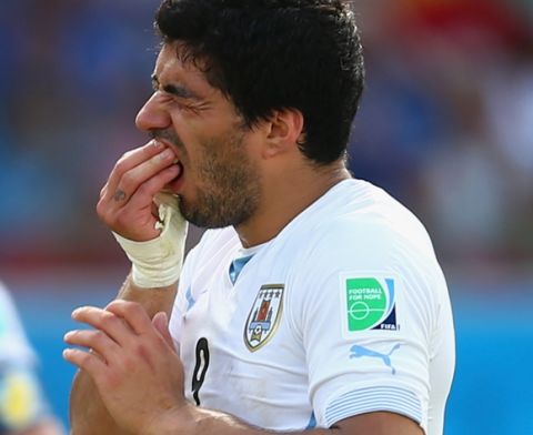 NATAL, BRAZIL - JUNE 24:  Luis Suarez of Uruguay reacts during the 2014 FIFA World Cup Brazil Group D match between Italy and Uruguay at Estadio das Dunas on June 24, 2014 in Natal, Brazil.  (Photo by Clive Rose/Getty Images)