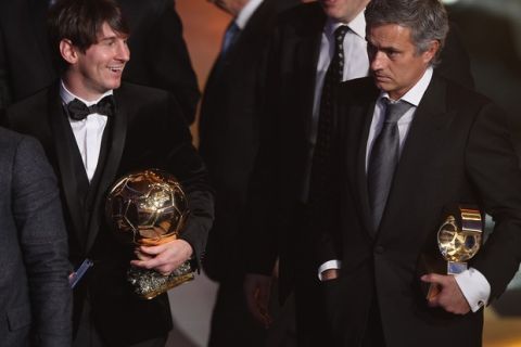 ZURICH, SWITZERLAND - JANUARY 10:  Lionel Messi (l) of Argentina and Barcelona FC winner of the men's player of the year alongside Jose Mourinho (r) of Portugal and Real Madrid FC winner of coach of the yea award during the FIFA Ballon d'or Gala at the Zurich Kongresshaus on January 10, 2011 in Zurich, Switzerland.  (Photo by Michael Steele/Getty Images)