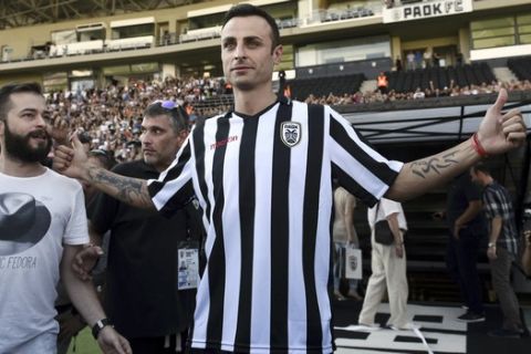 New PAOK signing Dimitar Berbatov of Bulgaria arrives for a special reception ceremony at the club's Toumba stadium in the northern Greek city of Thessaloniki, on Thursday, Sept. 3, 2015. An estimated 7,000 PAOK fans turned up. Former Manchester United striker Berbatov, 34, has a contract with last year's Greek league runners-up until July 2016. (AP Photo/Giannis Papanikos)