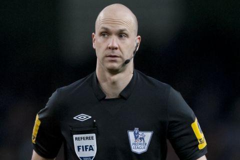 Referee Anthony Taylor during Manchester City's English Premier League soccer match against Liverpool at The Etihad Stadium, Manchester, England, Sunday Feb. 3, 2013. (AP Photo/Jon Super)
