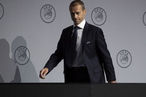 UEFA President Aleksander Ceferin arrives for a press conference following a meeting of European soccer leaders at the congress of the UEFA governing body in Amsterdam's Beurs van Berlage, Netherlands, Tuesday, March 3, 2020. (AP Photo/Peter Dejong)
