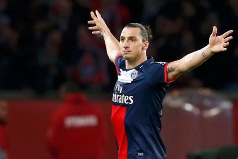 Paris Saint-Germain's Zlatan Ibrahimovic celebrates after scoring the third goal for the team during their French Ligue 1 soccer match against Brest at the Parc des Princes stadium in Paris May 18, 2013.        REUTERS/Gonzalo Fuentes (FRANCE  - Tags: SPORT SOCCER)  