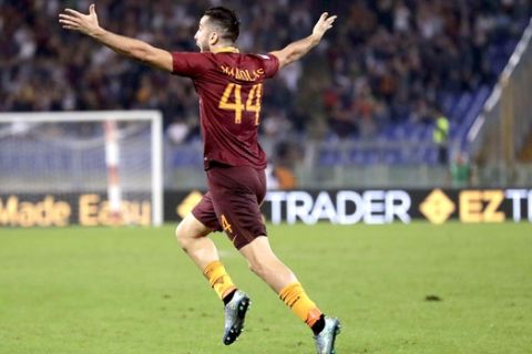 Roma¢s Kostas Manolas celebrates after scoring during a Serie A soccer match between Roma and Inter Milan, at Rome's Olympic Stadium, Sunday, Oct. 2, 2016. (AP Photo/Andrew Medichini)