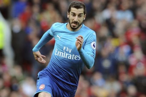 Arsenal's Henrikh Mkhitaryan during the English Premier League soccer match between Manchester United and Arsenal at the Old Trafford stadium in Manchester, England, Sunday, April 29, 2018. (AP Photo/Rui Vieira)