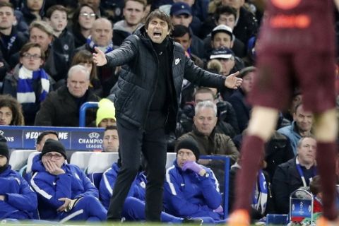 Chelsea head coach Antonio Conte reacts during the Champions League, round of 16, first-leg soccer match between Chelsea and Barcelona at Stamford Bridge stadium, Tuesday, Feb. 20, 2018. (AP Photo/Frank Augstein)