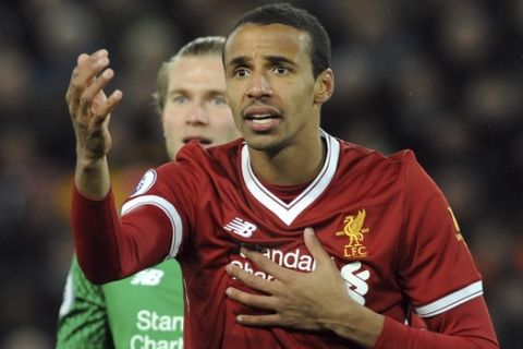 Liverpool's Joel Matip during the English Premier League soccer match between Liverpool and Tottenham Hotspur at Anfield in Liverpool, England, Sunday, Feb. 4, 2018. (AP Photo/Rui Vieira)