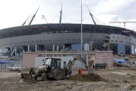 The Zenit Arena stadium which will host some 2018 World Cup matches, under construction in St.Petersburg, Russia, Tuesday, April 5, 2016.  A delegation from FIFA and the 2018 FIFA World Cup Russia Local Organising Committee  (LOC) are making a third operational planning tour of the Russian stadiums which will host 2018 FIFA World Cup. (AP Photo/Dmitri Lovetsky)