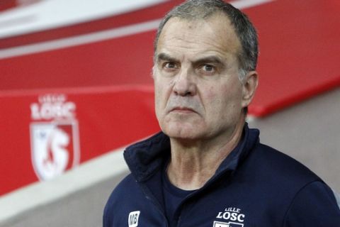 Lille coach Marcelo Bielsa looks on before their French League one soccer match against Marseille at the Lille Metropole stadium, in Villeneuve d'Ascq, northern France, Sunday, Oct. 29, 2017. (AP Photo/Michel Spingler)