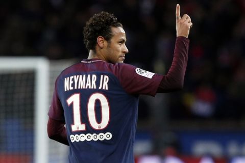 PSG's Neymar celebrates after scoring during his French League One soccer match between Paris-Saint-Germain and Dijon, at the Parc des Princes stadium in Paris, France, Wednesday, Jan. 17, 2018. (AP Photo/Thibault Camus)