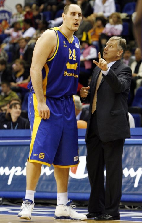 MOSCOW - OCTOBER 5:  Pavel Podkolzin #24 of CSKA speaks to his coach Sergey Elevich during a game against BC Khimki during the NBA Europe Live Tour on October 5, 2006 in Moscow, Russia.  NOTE TO USER: User expressly acknowledges and agrees that, by downloading and/or using this Photograph, user is consenting to the terms and conditions of the Getty Images License Agreement. Mandatory Copyright Notice: Copyright 2006 NBAE  (Photo by Nathaniel S. Butler/NBAE via Getty Images)