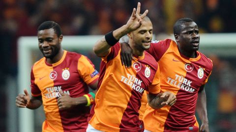 Galatasaray's Brazilian midfielder Felipe Melo (C) celebrates scoring a goal during the UEFA Champions League Group B football match between Galatasaray and FC Copenhagen on October 23, 2013 at the Turk Telekom Arena in Istanbul.  AFP PHOTO/BULENT KILIC        (Photo credit should read BULENT KILIC/AFP/Getty Images)