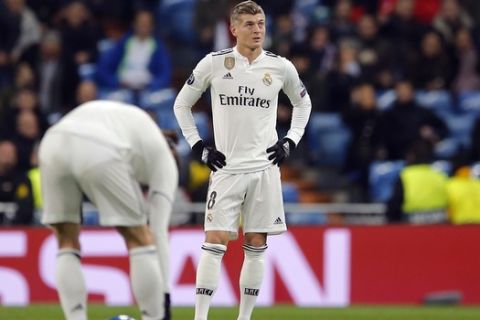 Real midfielder Toni Kroos looks up after CSKA midfielder Arnor Sigurdsson scored his side's third goal during the Champions League, Group G soccer match between Real Madrid and CSKA Moscow, at the Santiago Bernabeu stadium in Madrid, Spain, Wednesday Dec. 12, 2018. (AP Photo/Paul White)