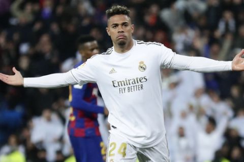 Real Madrid's Mariano Diaz celebrates after scoring his side's second goal during during the Spanish La Liga soccer match between Real Madrid and Barcelona at the Santiago Bernabeu stadium in Madrid, Spain, Sunday, March 1, 2020. (AP Photo/Manu Fernandez)