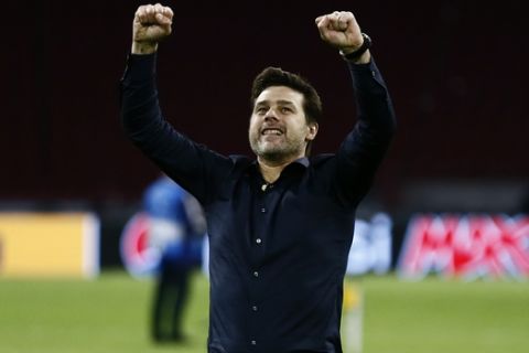 Tottenham coach Mauricio Pochettino gestures to the fans at the end of the Champions League semifinal second leg soccer match between Ajax and Tottenham Hotspur at the Johan Cruyff ArenA in Amsterdam, Netherlands, Wednesday, May 8, 2019. (AP Photo/Peter Dejong)