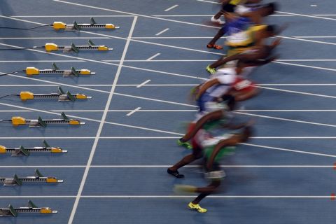 Athletes start for Men's 100m heat  at the World Athletics Championships in Daegu, South Korea, Saturday, Aug. 27, 2011. (AP Photo/Kin Cheung)