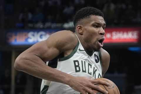 Milwaukee Bucks' Giannis Antetokounmpo goes past Indiana Pacers' Isaiah Jackson (22) during the second half of an NBA basketball game, Thursday, Nov. 9, 2023, in Indianapolis. (AP Photo/Darron Cummings)