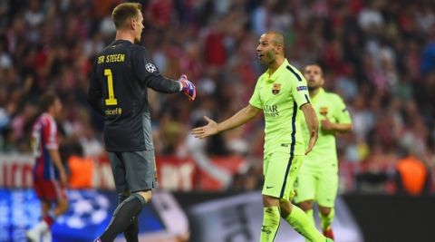 MUNICH, GERMANY - MAY 12:  Marc-Andre ter Stegen and Javier Mascherano of Barcelona celebrate as Neymar scores their second goal during the UEFA Champions League semi final second leg match between FC Bayern Muenchen and FC Barcelona at Allianz Arena on May 12, 2015 in Munich, Germany.  (Photo by Lars Baron/Bongarts/Getty Images)