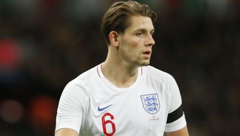 England's James Tarkowski reacts to teammates during the friendly soccer match between England and Italy at Wembley stadium London, Tuesday, March, 27, 2018. (AP Photo/Alastair Grant)