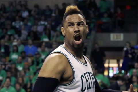 Boston Celtics center Jared Sullinger yells after being fouled by Atlanta Hawks forward Kent Bazemore during the third quarter in Game 3 of a first-round NBA basketball playoff series Friday, April 22, 2016, in Boston. The Celtics won 111-103. (AP Photo/Elise Amendola)